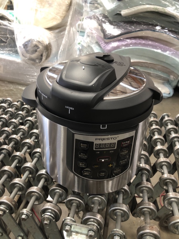 Photo 1 of 6 Qt. Black Stainless Steel Electric Pressure Cooker with Built-In Timer
model: 0214102