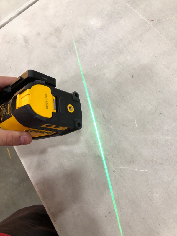 Photo 2 of 165 ft. Green Self-Leveling Cross Line Laser Level with (3) AAA Batteries & Case