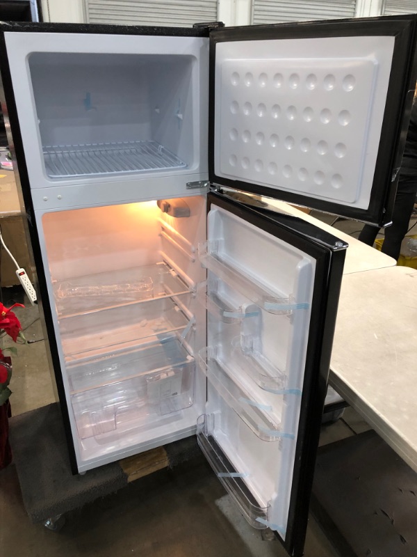 Photo 3 of *SEE last picture for damage*
RCA RFR786-BLACK 2 Door Apartment Size Refrigerator with Freezer, 7.5 cu. ft, Retro Black
