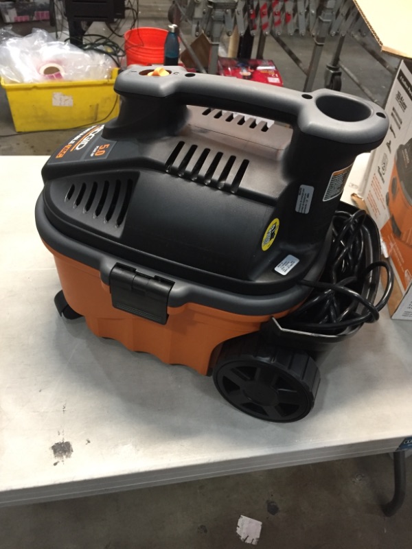 Photo 2 of *USED*
RIDGID 4 Gallon 5.0-Peak HP Portable Wet/Dry Shop Vacuum with Fine Dust Filter, Hose and Accessories