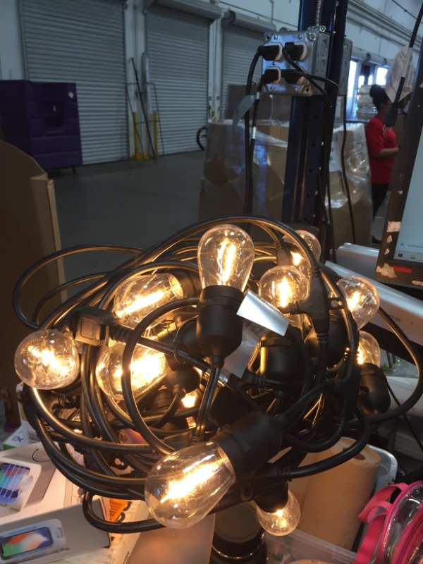 Photo 2 of 24-Light Indoor/Outdoor 48 ft. String Light with S14 Single Filament LED Bulbs 
AS IS USED 