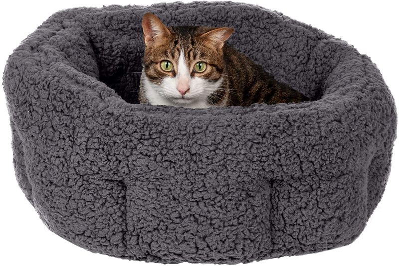 Photo 1 of 
Furhaven Cozy Pet Beds for Small, Medium, and Large Dogs and Cats - Ultra Calming Plush Donut Bed, Beanbag Style Ball Bed, Travel Dog Bed, and More
Color:Terry Charcoal Gray
Size:Small
Style:Self-Warming Cuddler Bed