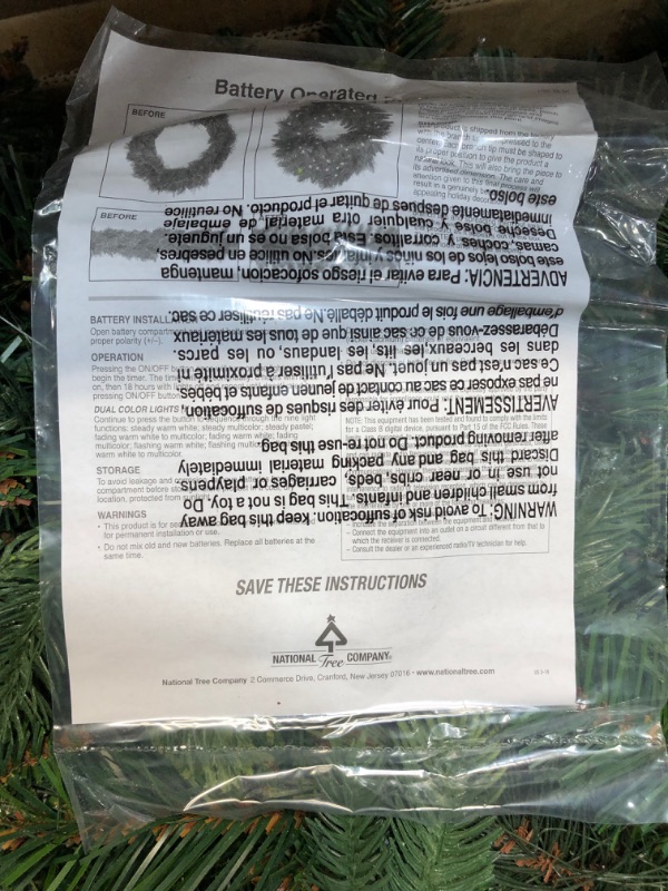 Photo 1 of National Tree Company Pre-Lit Artificial Christmas Garland, Green, Carolina Pine, White Lights, Decorated with Pine Cones, Battery Operated, Christmas...
