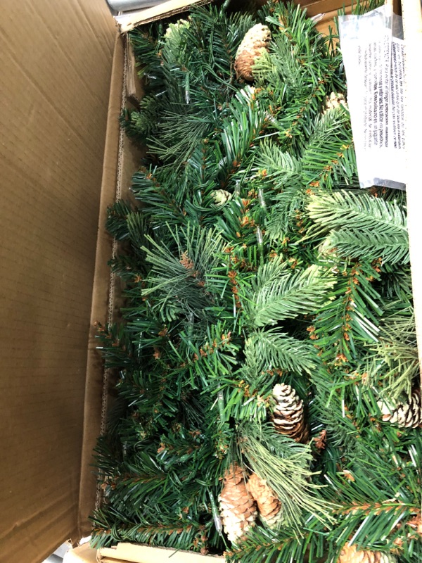Photo 1 of National Tree Company Pre-Lit Artificial Christmas Garland, Green, Carolina Pine, White Lights, Decorated with Pine Cones, Battery Operated, Christmas...
