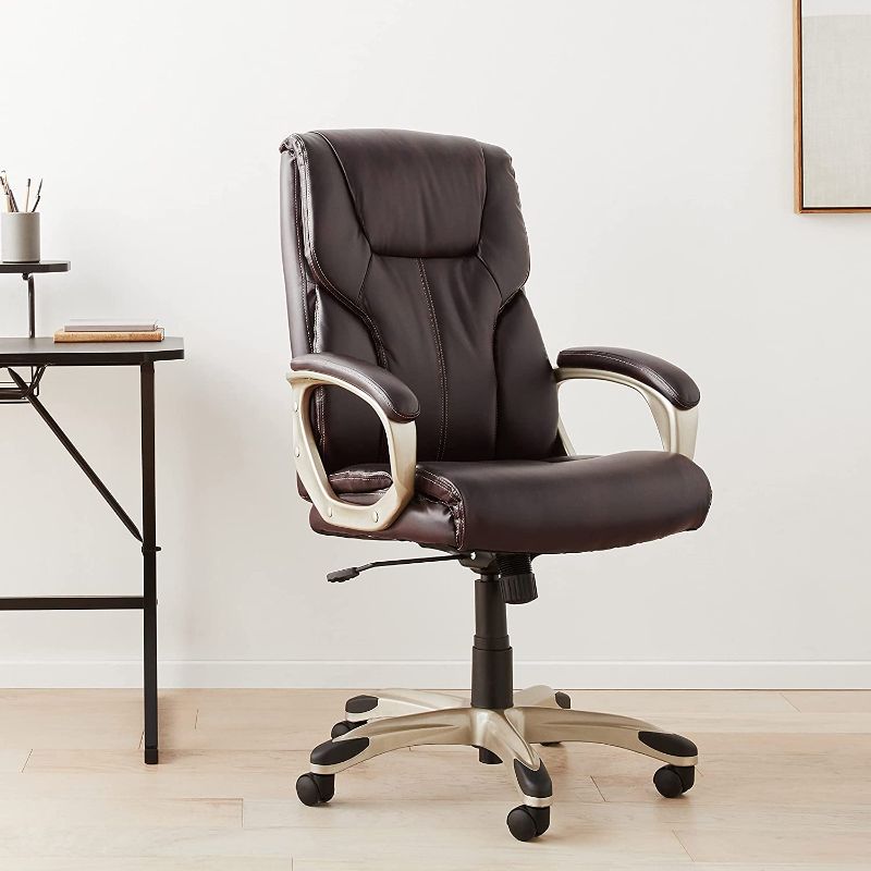 Photo 1 of Amazon Basics Executive Office Desk Chair with Armrests, Adjustable Height/Tilt, 360-Degree Swivel, 275Lb Capacity - Brown/Gold
