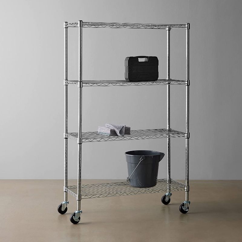 Photo 1 of Amazon Basics 4-Shelf Heavy Duty Shelving Storage Unit on 3'' Wheel Casters, Metal Organizer Wire Rack, 36"L x 14"W x 57.75"H - Black
