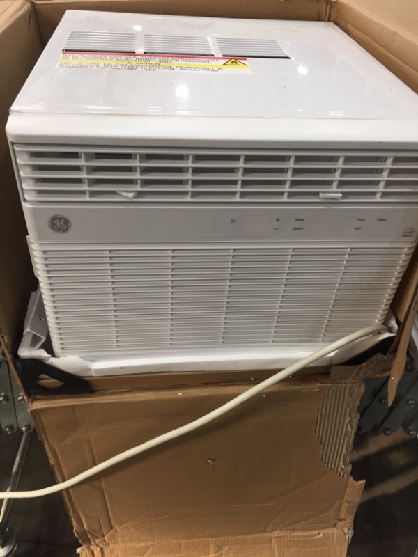 Photo 2 of GE Energy Star 10,000 BTU Smart Electronic Window Air Conditioner for Medium Rooms up to 450 sq ft, White
DIRTY.