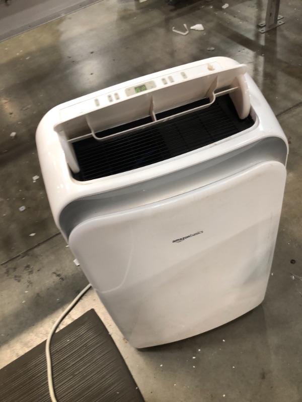 Photo 2 of Amazon Basics Portable Air Conditioner with Remote - Cools 550 Square Feet, 12,000 BTU ASHARE / 8000 BTU SACC
