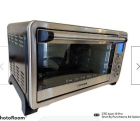 Photo 1 of PARTS ONLY 
TOSHIBA Digital Toaster Oven with Convection Cooking and 9 Functions AC25CEW-SS
