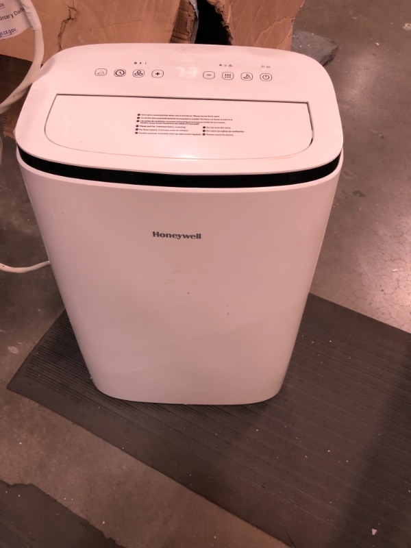 Photo 2 of Honeywell 15,000 BTU Portable Air Conditioner with Dehumidifier & Fan Cools Rooms Up To 775 Sq. Ft. with Remote Control, HJ5CESWK0, White/Black