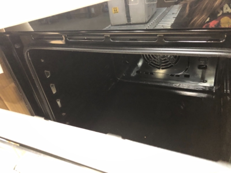 Photo 4 of 1.7 cu. ft. Over the Range Microwave Oven in Stainless Steel
