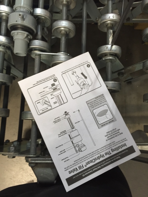 Photo 2 of Water-Saving Toilet Total Repair Kit with Dual Flush Valve
AS IS USED