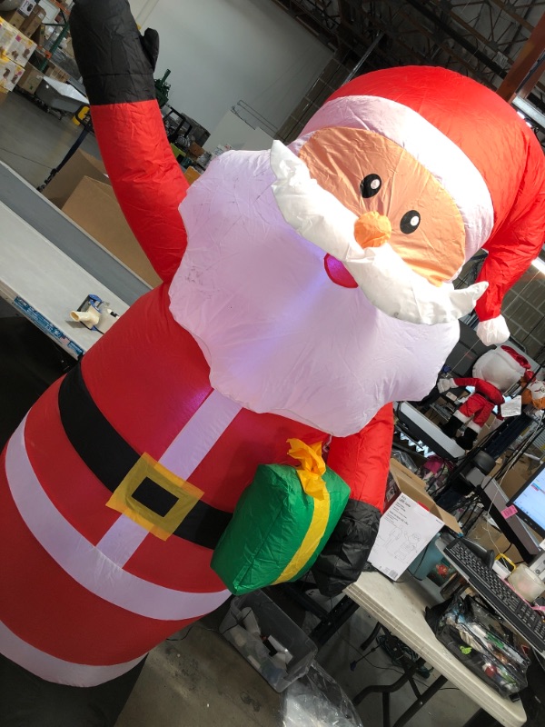 Photo 2 of ***2 pack***Only one power source***
Home Accents Holiday 6.5 Ft  and 3.5 ft Pre-Lit LED Santa Christmas Inflatable's.