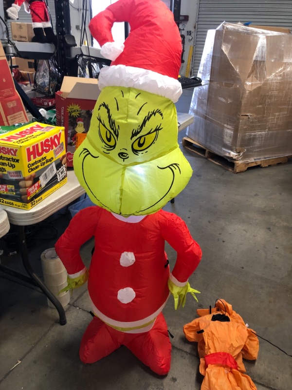 Photo 2 of *One power source only*
4.5 Ft. Airblown-Grinch and Max Value Pack-Dr. Seuss Christmas plus Christmas tree Inflatable
