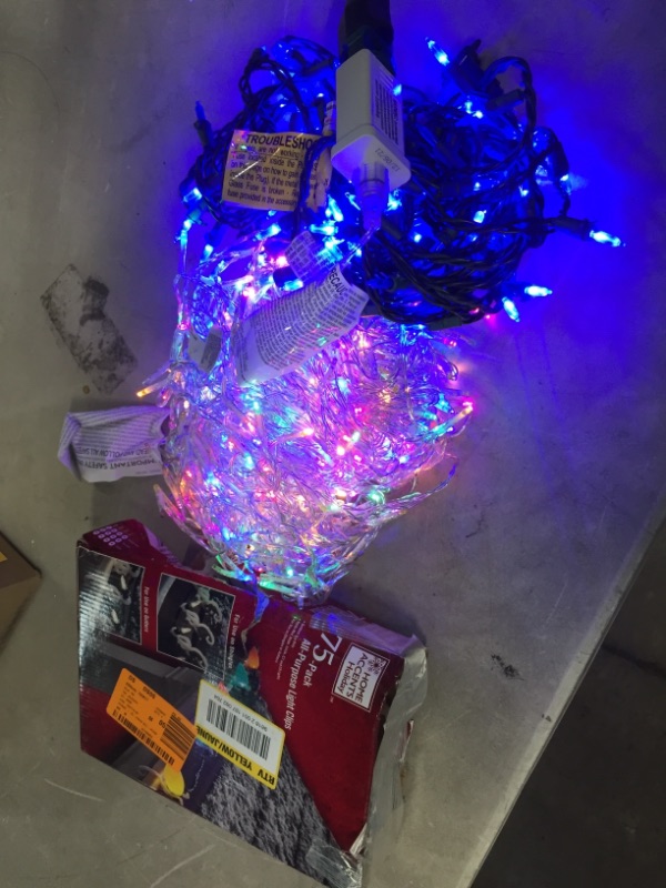 Photo 1 of ***NO RETURNS***NO REFUNDS***
Assortment of Christmas lights and hooks.
