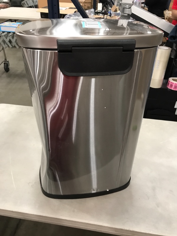 Photo 3 of *SEE last pictures for damage* 
iTouchless SoftStep 13.2 Gallon Stainless Steel Step Trash Can with Silent and Gentle Lid Close, 50 Liter Pedal Garbage Bin for Kitchen, Home, Office
