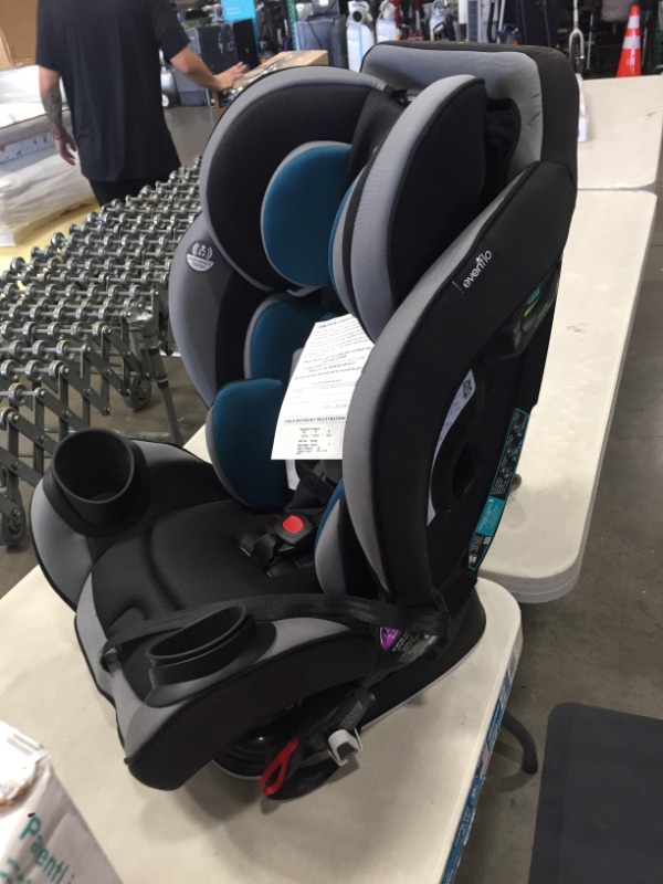 Photo 1 of Evenflo EveryStage DLX Convertible Car & Booster Seat, Rear-Facing Ratchet Tightened, For Ages Infant to 10, Reef Blue