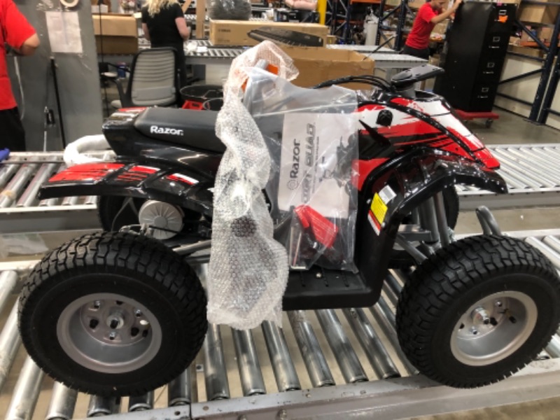 Photo 4 of Razor Dirt Quad - 24V Electric 4-Wheeler ATV - Twist-Grip Variable-Speed Acceleration Control, Hand-Operated Disc Brake, 12" Knobby Air-Filled Tires
