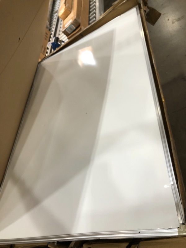 Photo 1 of large mobile double-sided whiteboard 60x40//item is damaged//small dents 