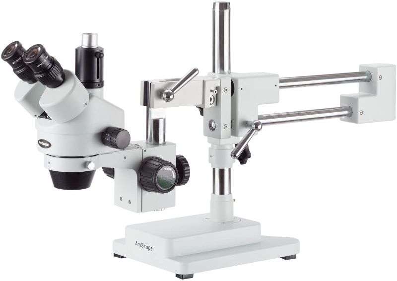 Photo 1 of AmScope SM-4T Professional Trinocular Stereo Zoom Microscope, WH10x Eyepieces, 7X-45X Magnification, 0.7X-4.5X Zoom Objective, Ambient Lighting, Double-Arm Boom Stand
