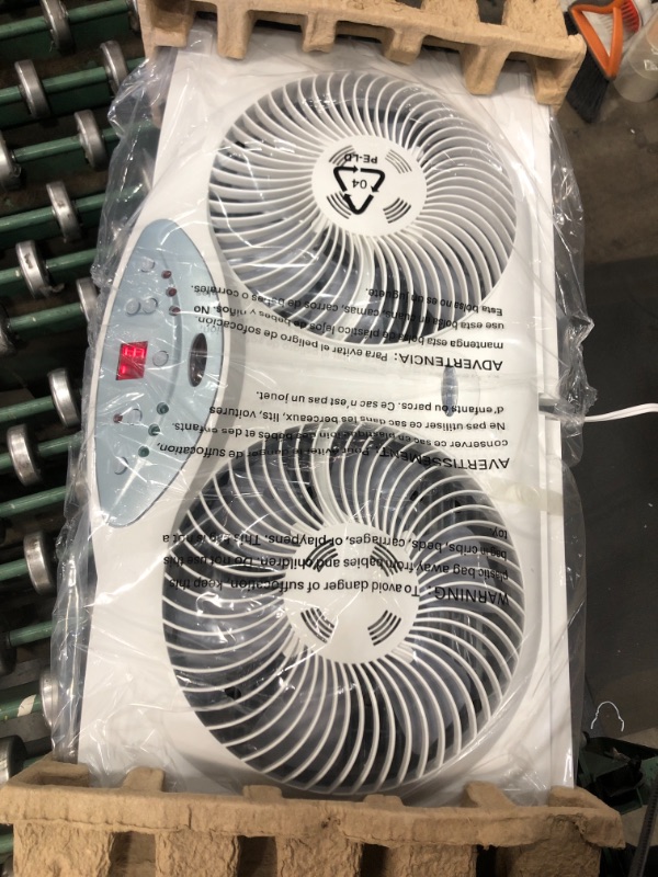 Photo 2 of Bionaire Window Fan with Twin 8.5-Inch Reversible Airflow Blades and Remote Control, White
