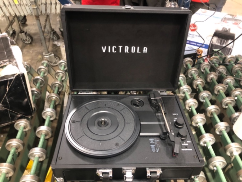 Photo 2 of Victrola Vintage 3-Speed Bluetooth Portable Suitcase Record Player with Built-in Speakers | Upgraded Turntable Audio Sound| Includes Extra Stylus | Black, Model Number: VSC-550BT-BK


//tested, powers on//could not connect to Bluetooth //missing screws 