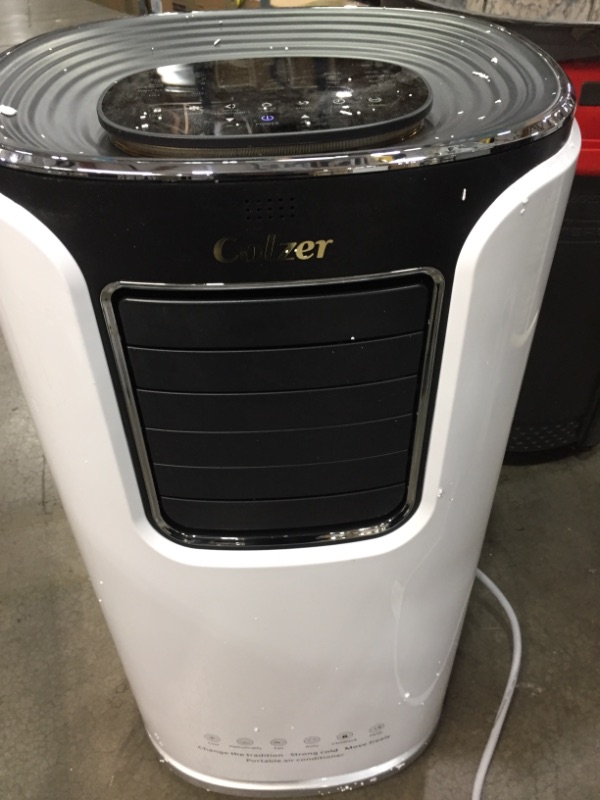 Photo 2 of COLZER 500Sq Ft Portable AC Air Conditioner Provides 1,4000 BTU Cooler, Built-in Dehumidifier, Fan and Auto Mode Included Complete Window Mount Exhaust...
