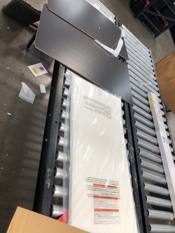 Photo 1 of Delta Children Wilmington Changing Table with Pad Black