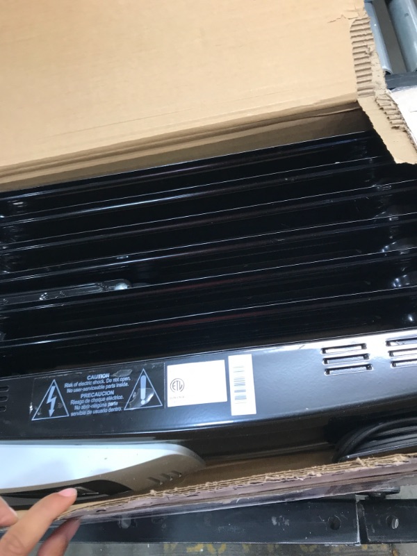 Photo 2 of PELONIS Electric 1500W Oil Filled Radiator Heater with Safety Protection, LED Display, 3 Heat Settings and Five Temperature settings. Perfect for for Home or Office
