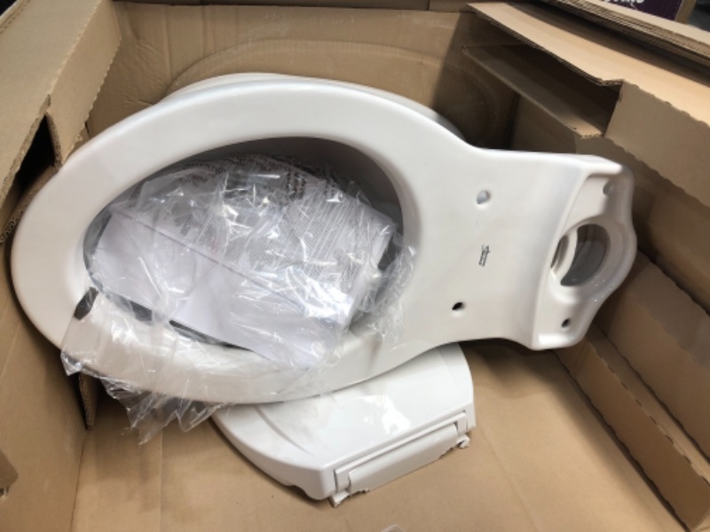 Photo 5 of Champion Tall Height 2-Piece High-Efficiency 1.28 GPF Single Flush Elongated Toilet in White Seat Included