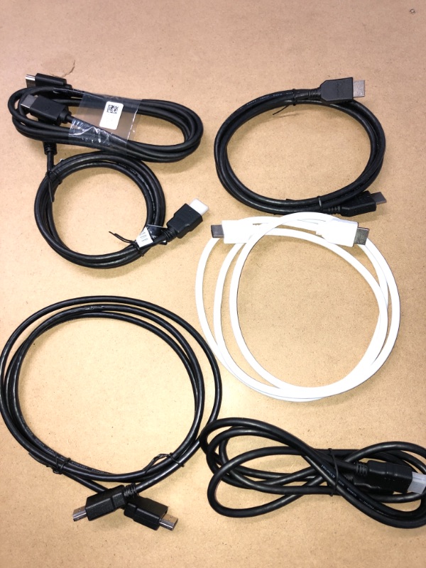 Photo 1 of SOLD AS IS - BUNDLE OF ASSORTED HDMI CORDS  ( DIFFERENT MODELS )