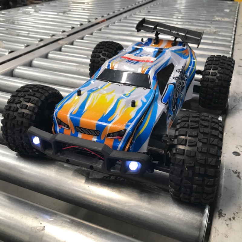 Photo 2 of Holyton Remote Control Car 1:10 Scale RC Cars 48+ KM/H High Speed 40+ min Play , 4WD All Terrains Off Road Monster Truck for Adults and Kids Hobby RC Truck Vehicle, 2 Battery Crawler Toy Gift for Boys
