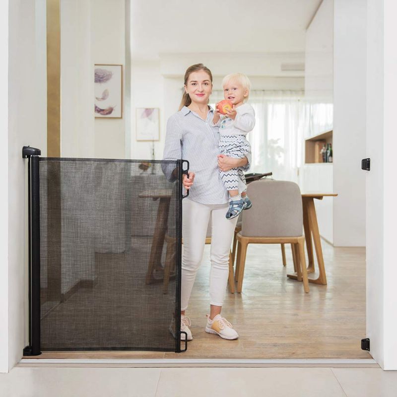 Photo 1 of EasyBaby Products Extra Wide and Extra Tall Indoor Outdoor Retractable Baby Gate Extends up to 71" Wide, 39.3" (100cm) Tall, Black
