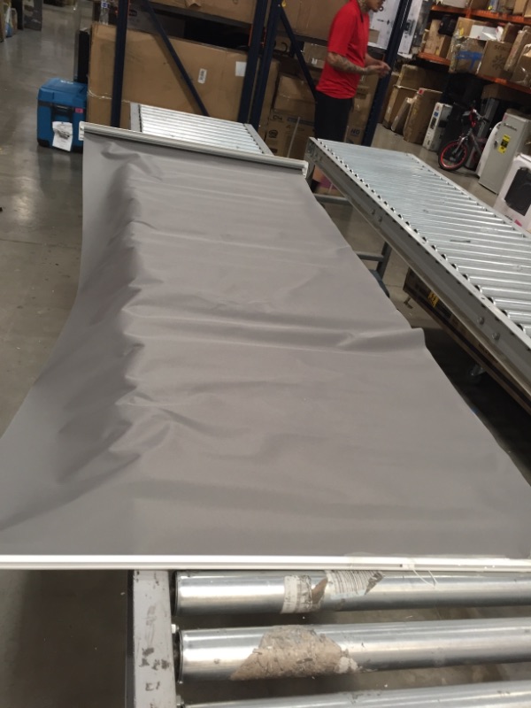 Photo 1 of gray pull up screen 6' 5" x 2' 8"