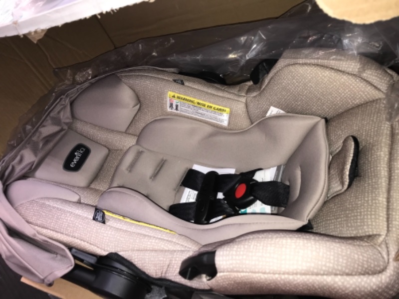 Photo 1 of Evenflo Pivot Modular Travel System with SafeMax Infant Car Seat - Sandstone