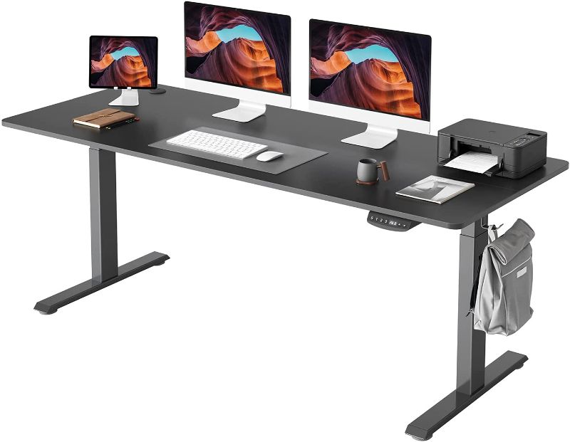 Photo 1 of FEZIBO Height Adjustable Electric Standing Desk, 40 x 24 Inches Stand up Table, Sit Stand Home Office Desk with Splice Board, Black Frame