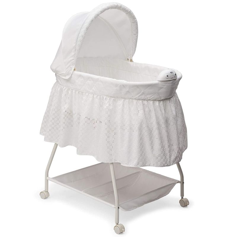 Photo 1 of Delta Children Deluxe Sweet Beginnings Bedside Bassinet - Portable Crib with Lights and Sounds, Turtle Dove
