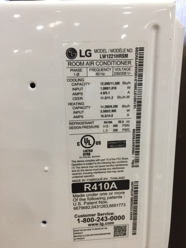 Photo 2 of LG Electronics 12,000 BTU 230/208-Volt Window Air Conditioner with Cool, Heat and Wi-Fi Control in White

//MISSING PANEL WHERE IT SHOWS TEMPERATURE 
