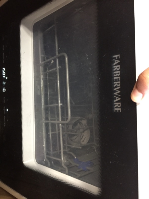 Photo 2 of Farberware FDW05ASBWHA Complete Portable Countertop Dishwasher with 5-Liter Built-in Water Tank, 5 Programs, Baby Care, Glass & Fruit Wash-Black/White

//TESTED AND FUNCTIONAL, MINOR COSMETIC DAMAGE 
