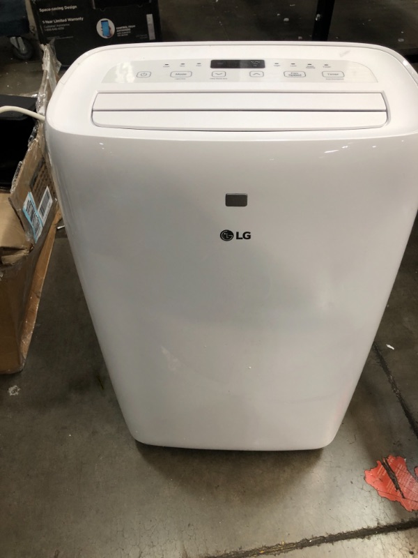 Photo 2 of LG 6,000 BTU (DOE) / 8,000 BTU (ASHRAE) Portable Air Conditioner, Cools 250 Sq.Ft. (10' x 25' room size), Quiet Operation, LCD Remote, Window Installation Kit Included, 115V
