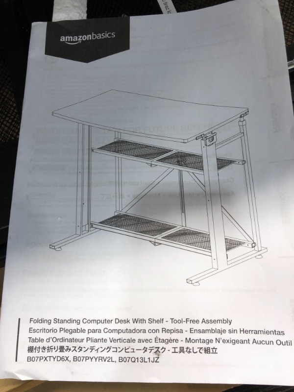 Photo 3 of Amazon Basics Foldable Standing Computer Desk with Storage Shelf, Adjustable Height, Easy Assembly - Black
