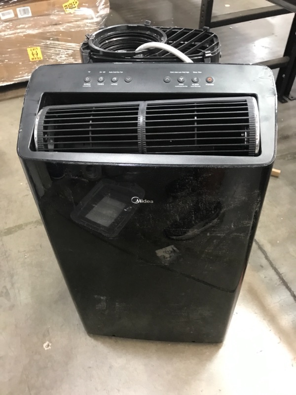 Photo 2 of Midea Duo 12,000 BTU(10,000 BTU SACC)Ultra Quiet Smart HE Inverter Portable Air Conditioner,Dehumidifier,and Fan-Cools upto 450 sq.ft,Works with Alexa/Google Assistant Includes Remote Control,Black
