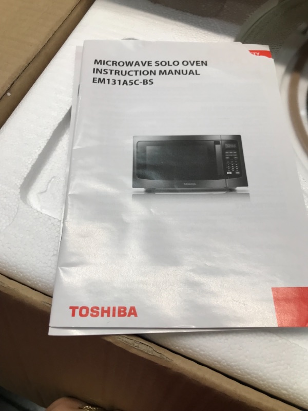 Photo 2 of ***PARTS ONLY*** toshiba em131a5c-bs microwave oven with smart sensor, easy clean interior, eco mode and sound on/off, 1.2 cu.ft, 1100w, black 
