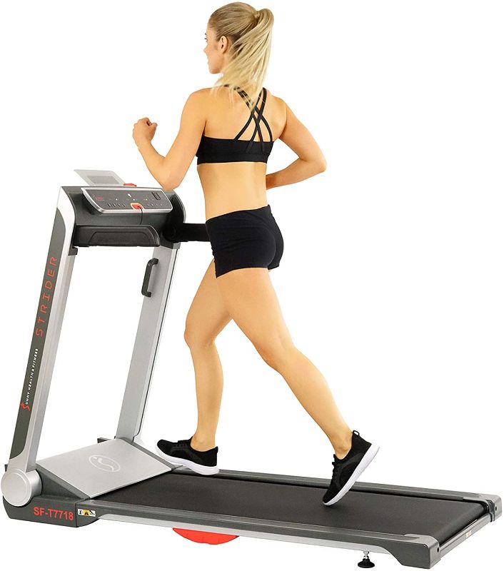 Photo 1 of Sunny Health & Fitness No Assembly Motorized Folding Running Treadmill, 20" Wide Belt, Flat Folding & Low Profile for Portability with Speakers for USB and AUX Audio Connection - Strider, SF-T7718

//MINOR COSMETIC DAMAGE 
