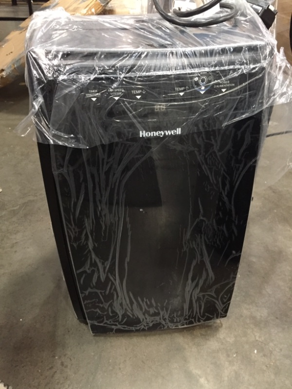 Photo 2 of Honeywell, MN12CEDBB 12,000 BTU Air Portable Conditioner with Dual Hose, 12000, Black
