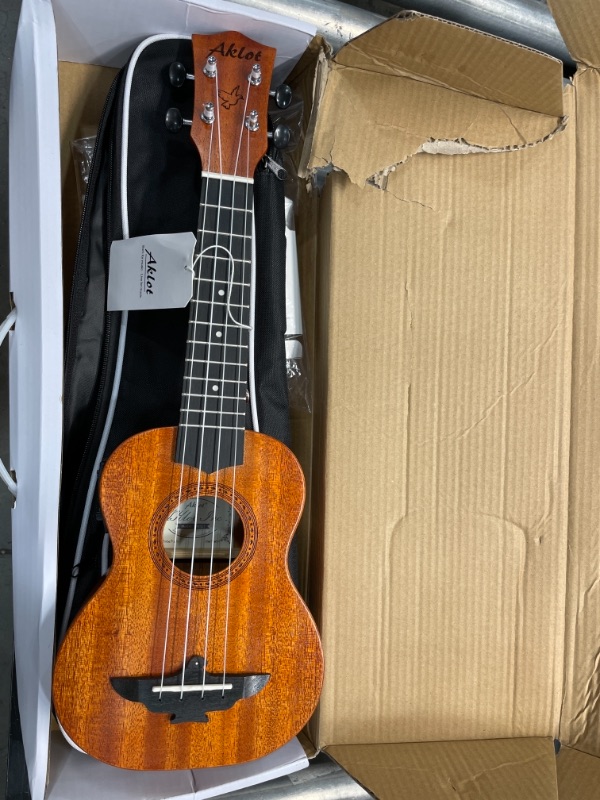 Photo 2 of AKLOT Electric Soprano Ukulele, 21 Inch Ukelele Solid Mahogany Uke for Professional Player with Equalizer Beginner Kit (Gig Bag, Picks, Strap, String, Cleaning Cloth, Starter Manual)
