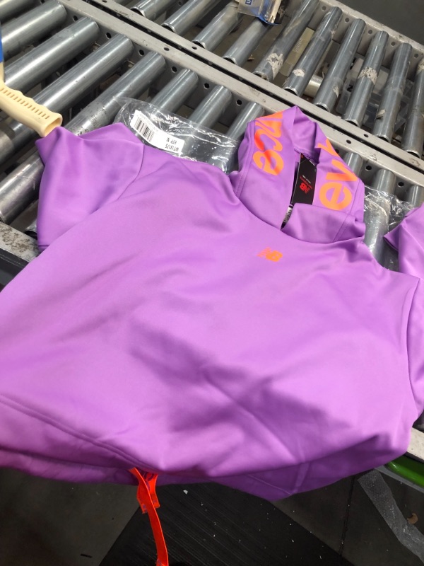 Photo 1 of **general post** new balance purple and neon orange medium layer/ sweater
