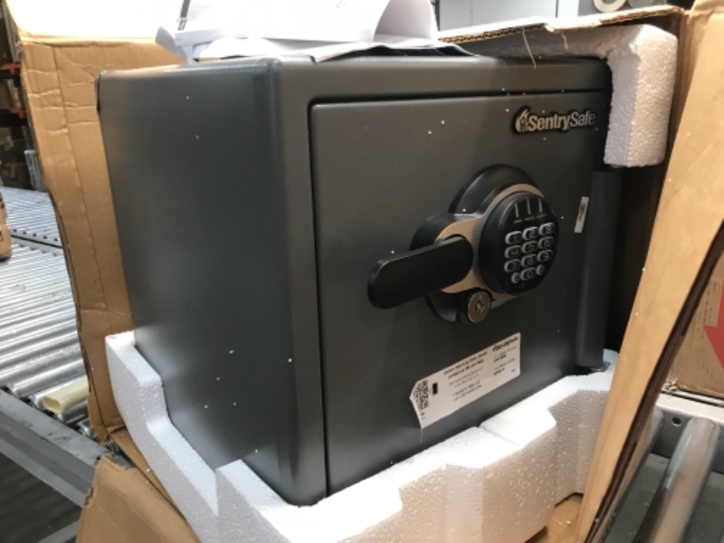 Photo 5 of LOCKED; NO KEYS  .
SentrySafe SFW123GDC Fireproof Waterproof Safe with Digital Keypad, 1.23 Cubic Feet, Gun Metal Gray
