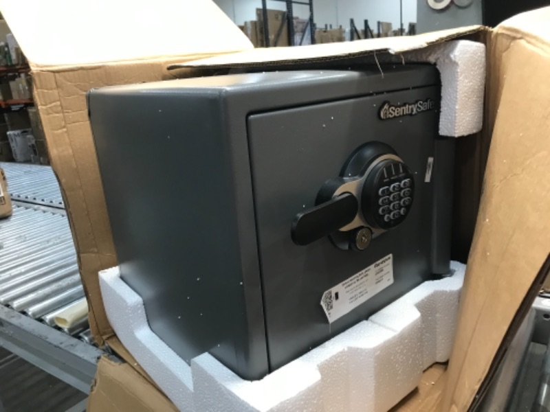 Photo 2 of LOCKED; NO KEYS  .
SentrySafe SFW123GDC Fireproof Waterproof Safe with Digital Keypad, 1.23 Cubic Feet, Gun Metal Gray
