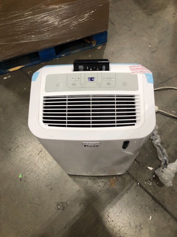 Photo 2 of COMPRESSOR NOT COMING ON 
De'Longhi 11000 BTU Portable Air Conditioner, Dehumidifier & Fan + Quiet Mode & Includes Window Kit + Remote Control, 400 sq ft, Medium Room, Pinguino 6000 (DOE), White